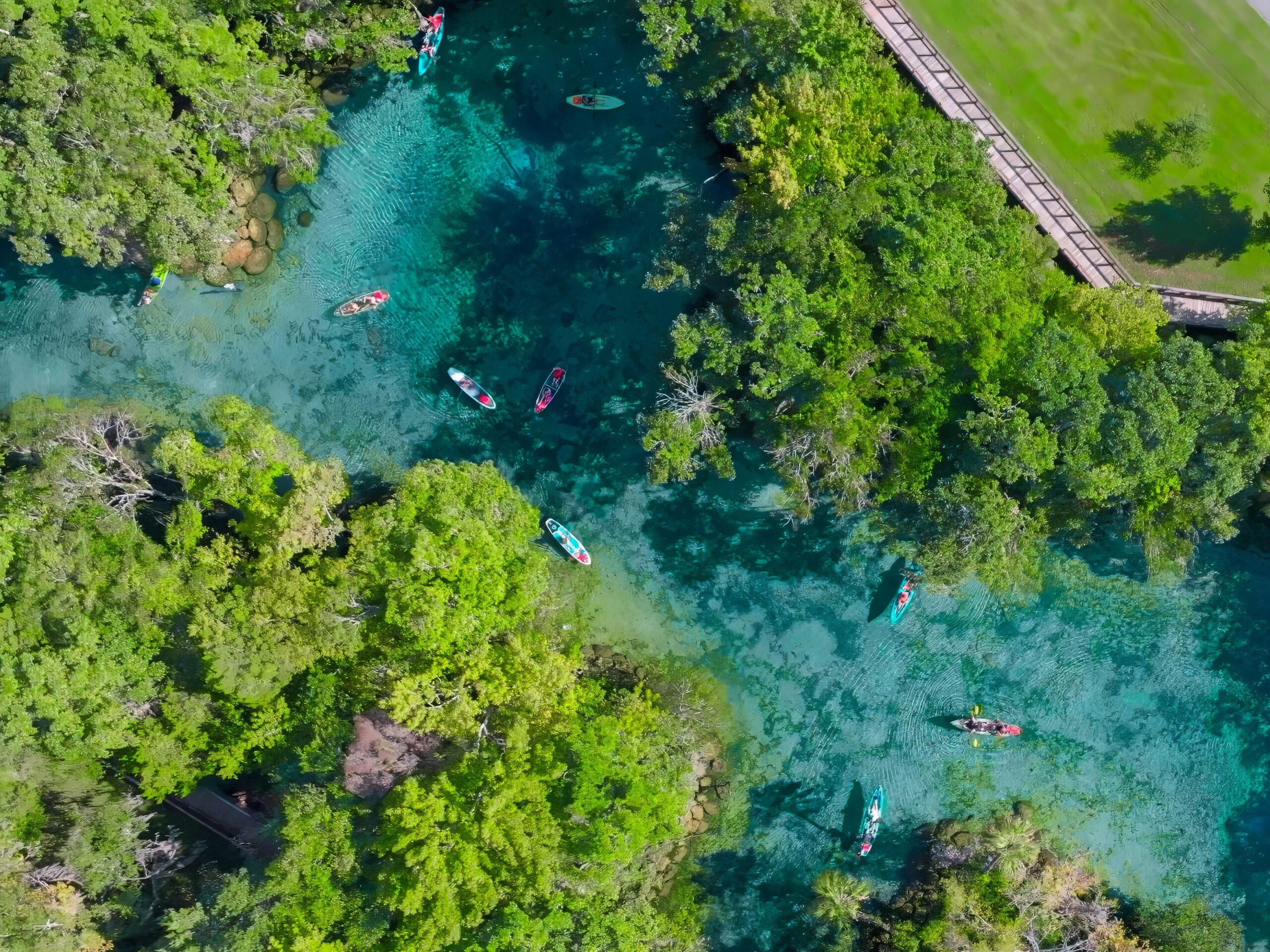Kayakers on spring-fed water near Crystal River, Florida